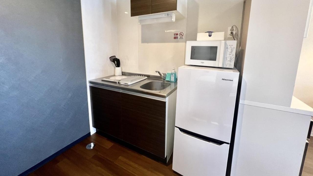 Apartment Hotel Ecott Кагошима Екстериор снимка